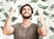 A happy man with cash raining in background