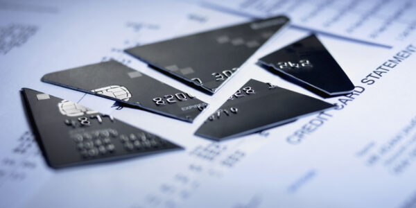 Credit card cut into pieces Credit card cut into pieces