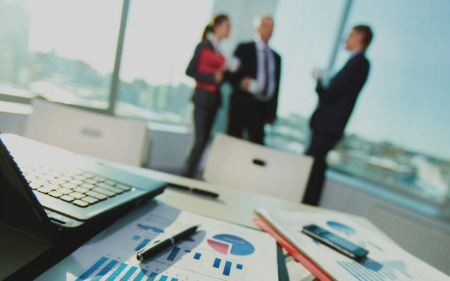 Business people busy in a meeting Business people busy in a meeting at an office