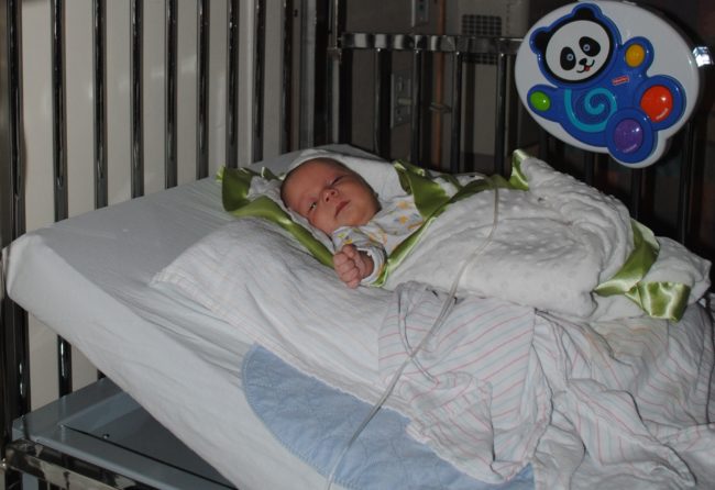 A newly born baby in a hospital