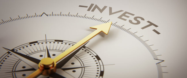 Clock needle pointing to investment Clock needle pointing to investment