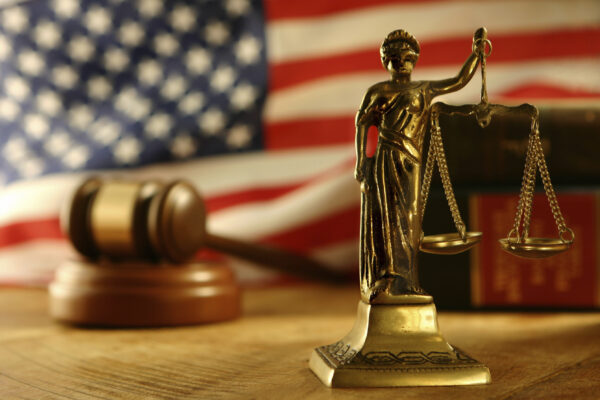 Scale of Justice and gavel Scale of Justice, gavel and American Flag