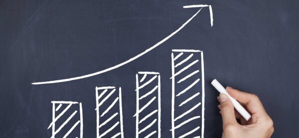 Arrow going up in bar chart graph Arrow going up in bar chart graph
