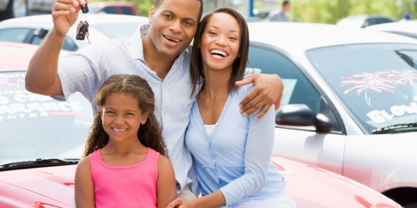 Happy family bought a red car