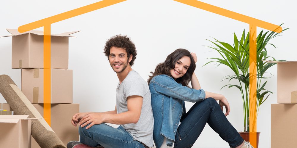 A happy couple imagining to buy their own home