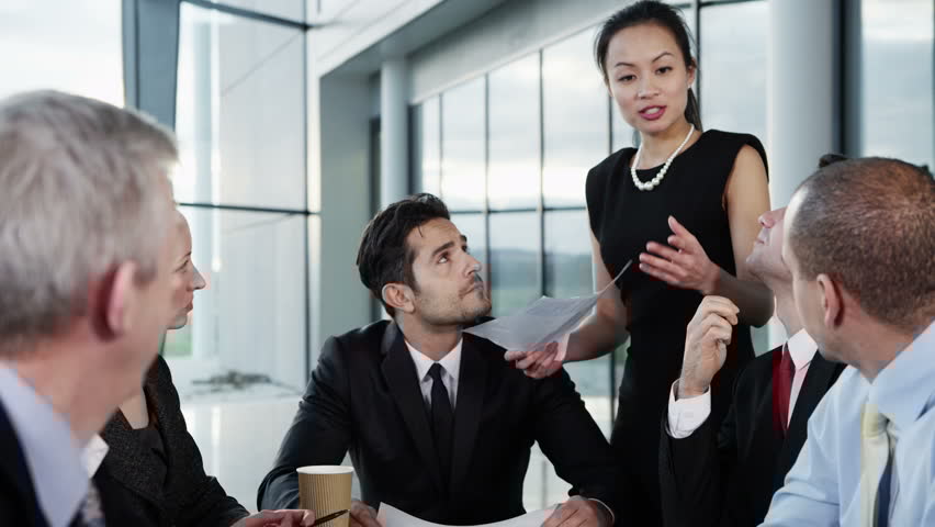 Four colleagues during a business meeting