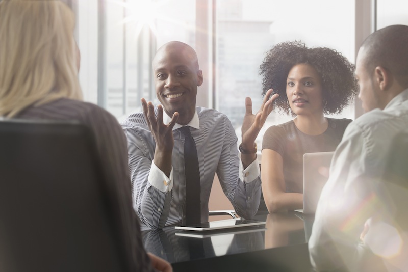 Business people during a meeting Business people in a meeting listening to one of them